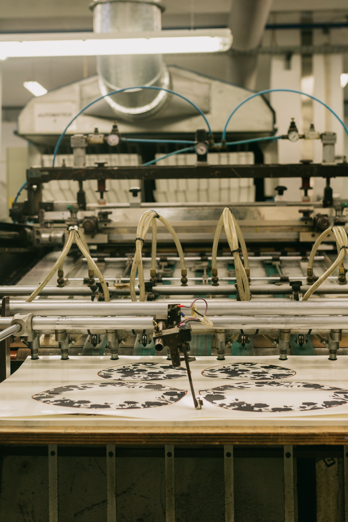 Crafting Captivating Headlines: Your awesome post title goes here Close-up view of a printing machine inside a Porto factory, showcasing industrial automation.